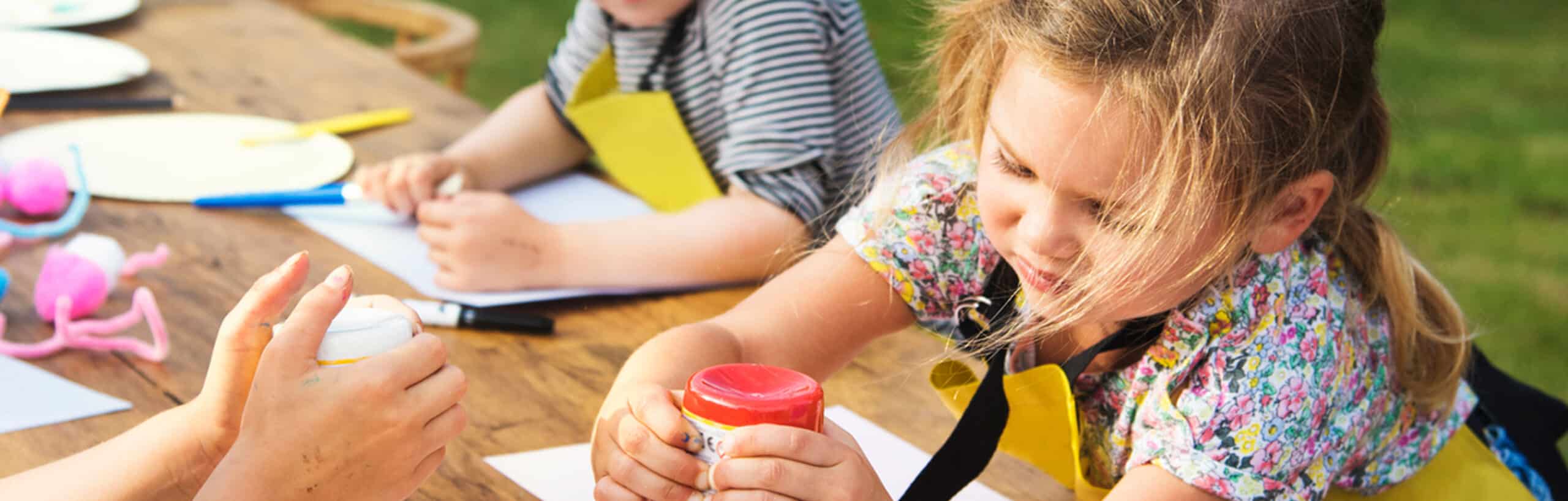 Children playing with paints