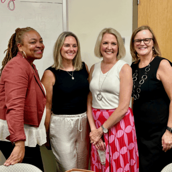 State Representatives Kamela Smith, Cyndie Romer, and Mara Gorman pose for a photo alongside UD CEHD Dean Rena Hallam at the DIEEC Block Party celebration.
